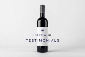 Wine Bottle with Intertwine logo and copy for Testimonials
